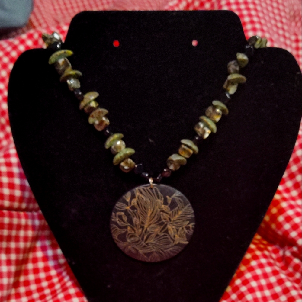 Wooden necklace pendant with glass beads